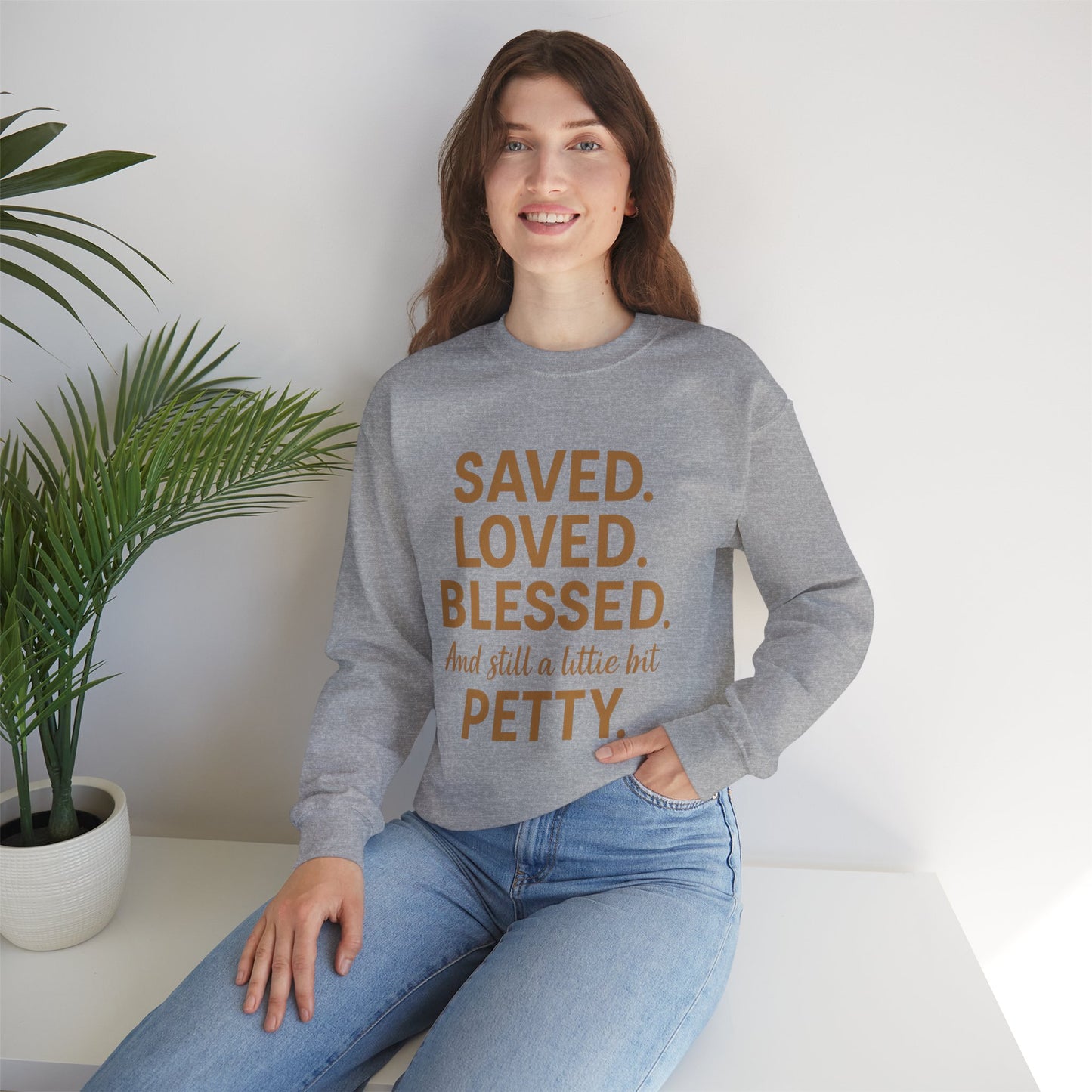 “Saved. Loved. Blessed. And Still a Little Bit Petty Unisex Christian Sweatshirt – Faith with Attitude”
