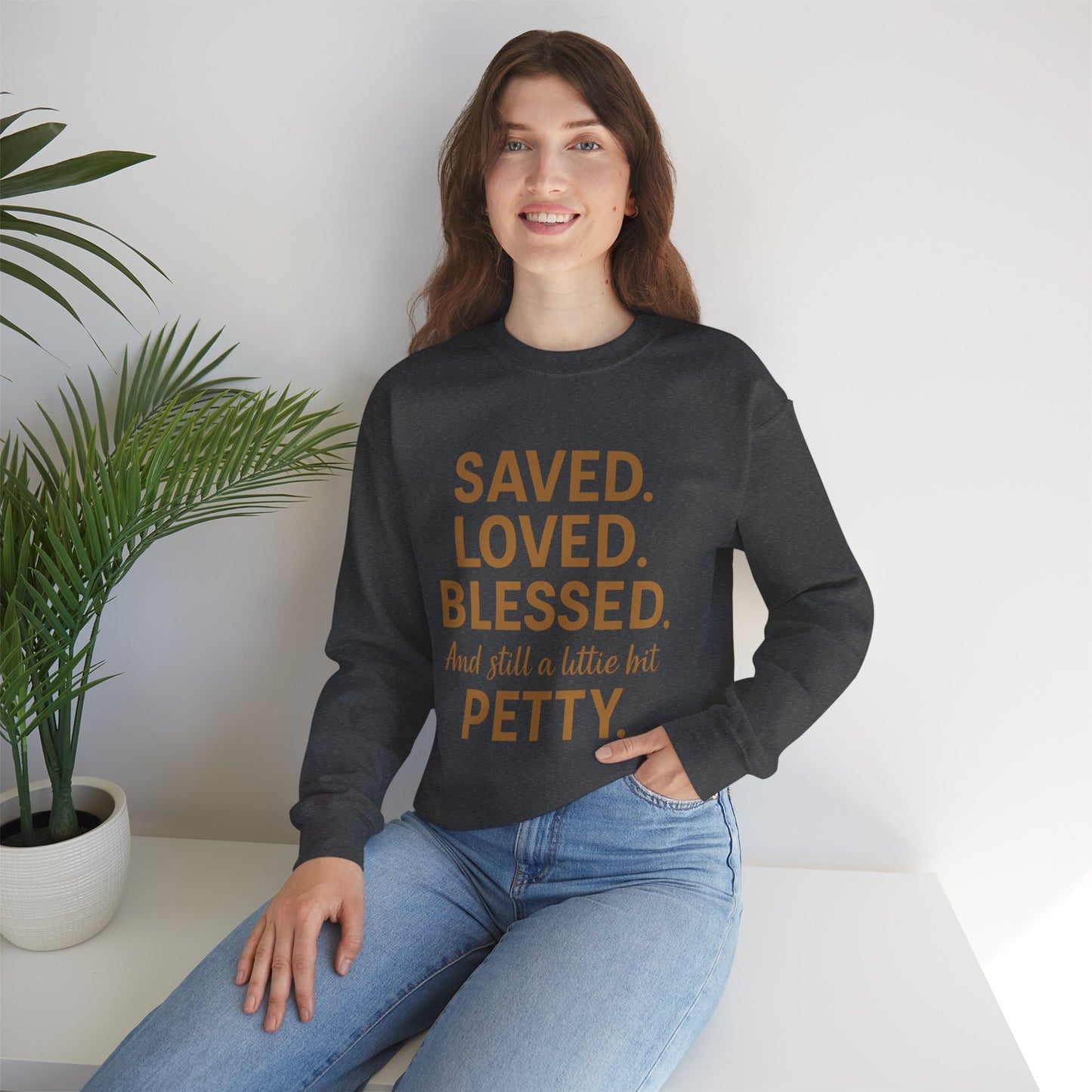 “Saved. Loved. Blessed. And Still a Little Bit Petty Unisex Christian Sweatshirt – Faith with Attitude”