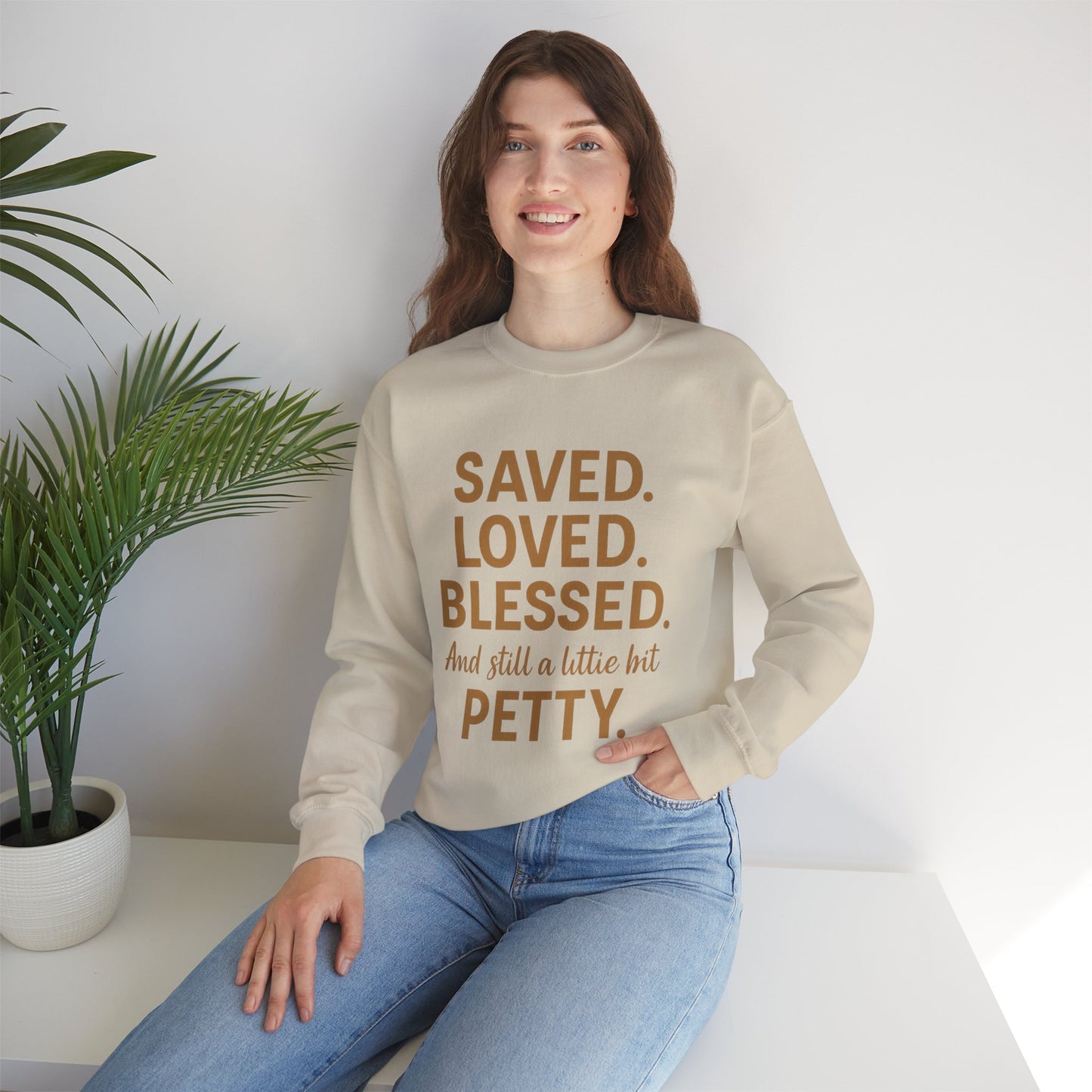 “Saved. Loved. Blessed. And Still a Little Bit Petty Unisex Christian Sweatshirt – Faith with Attitude”